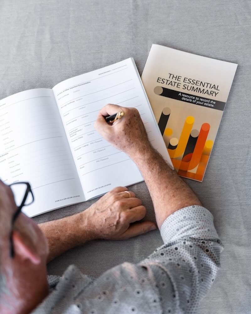 Elderly man completing the Essential Estate Summary